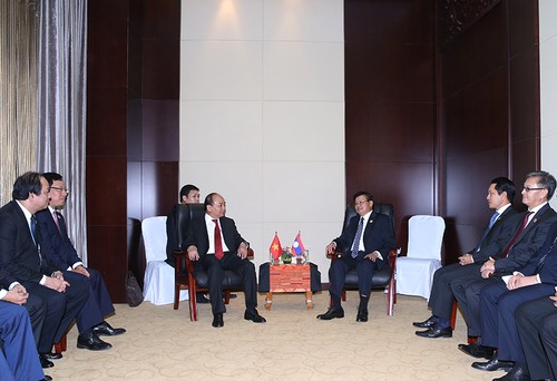 Thủ tướng Nguyễn Xuân Phúc có các cuộc hội kiến, gặp gỡ với các nhà lãnh đạo CHDCND Lào - ảnh 1
